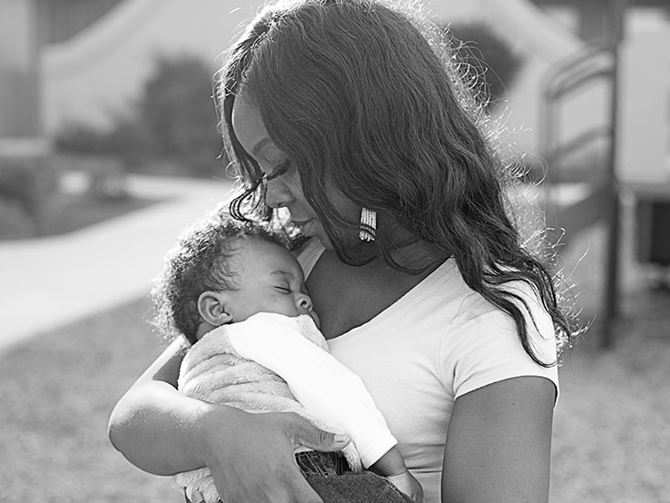 Woman holding a baby